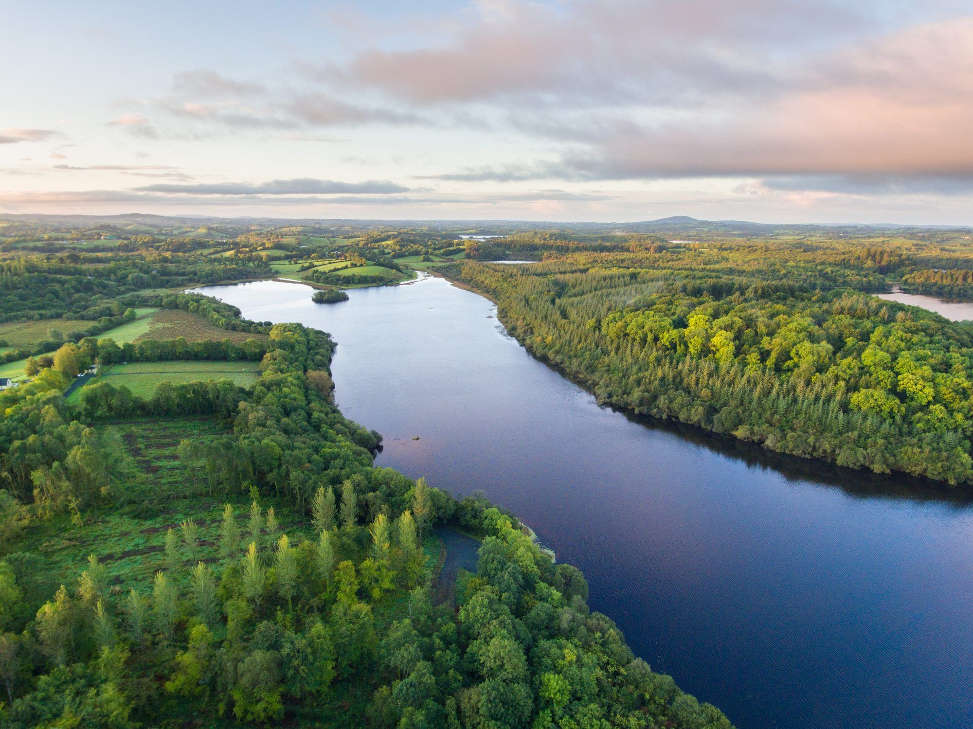 Aerial view of Lough Oughter winding through woodland in County Cavan